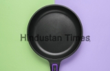 Frying,Pan,With,A,Non-stick,Coating,On,Green,Purple,Pastel