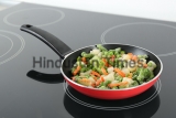 Cooking,Tasty,Frozen,Vegetable,Mix,On,Induction,Stove