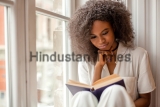 Pretty,African,American,Girl,With,Reading,A,Book,Sitting,On